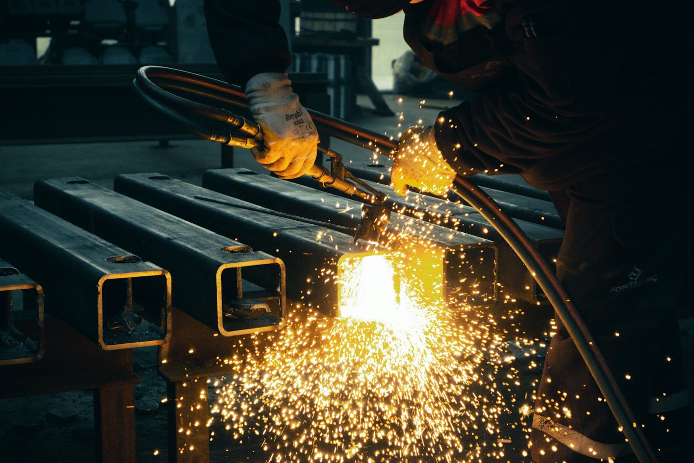 Sparks flying off steel sections